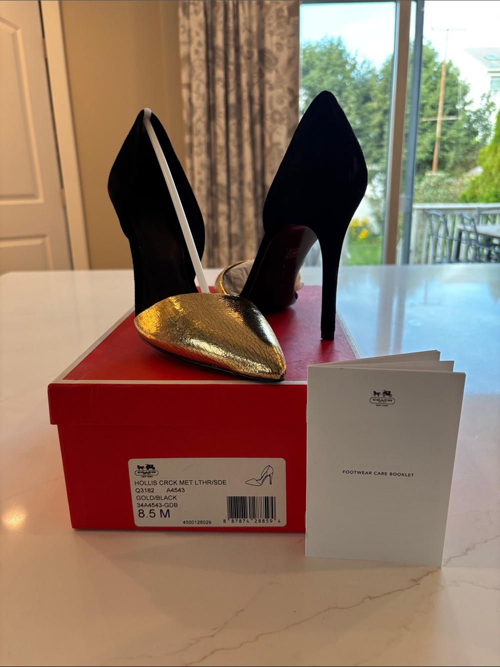 Coach Black and Gold Pointed Toe Stiletto Pumps